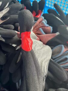 cut resistant gloves with reinforcement between croth